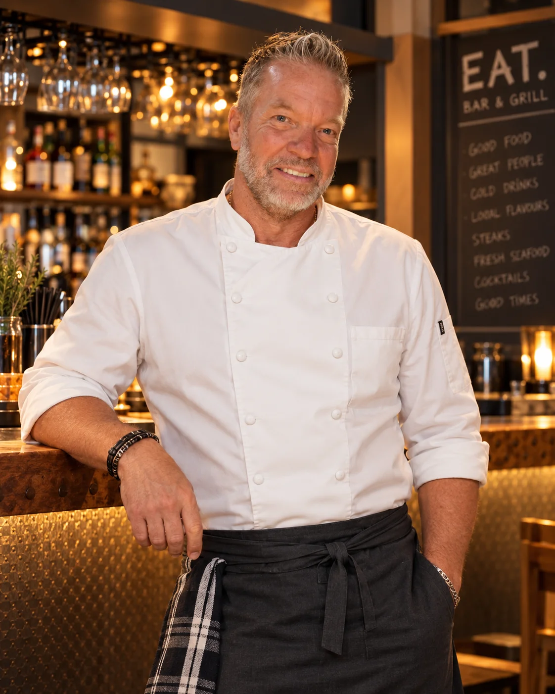 Creative portrait concept of EAT executive chef Christer Larsson in a white chef jacket